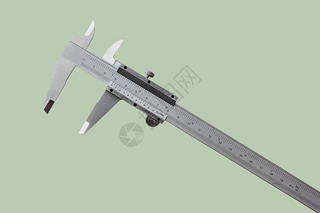 Vernier是衡量就业和行业的一个尺度手指测量乐器毫米束缚金属建造工作技术游标图片