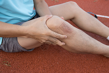 锻炼时腿部的膝盖关节问题疼痛骨头创伤治疗玩家男人医疗症状扭伤运动图片