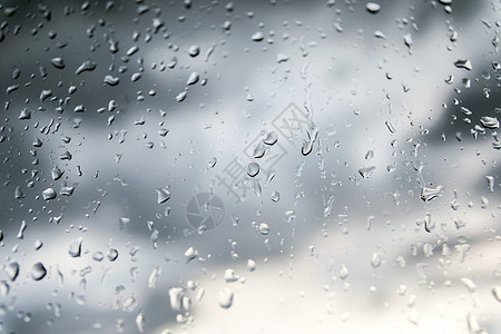 下雨和露水气泡飞沫雨滴墙纸流动玻璃水滴宏观圆圈蓝色图片