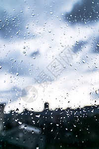 下雨和露水雨滴蓝色墙纸水滴流动液体玻璃飞沫圆圈宏观图片