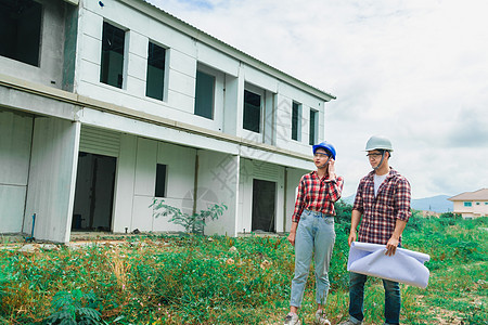 年轻的亚裔夫妇工头工程家主房检查大楼项目男人建筑师制造业建筑学维修修理工建造技术员帽子图片