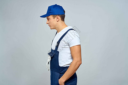 穿制服工服的男工提供生活生活方式服务背景浅度套装纸板商业工作室工人商务包装船运领带重量图片