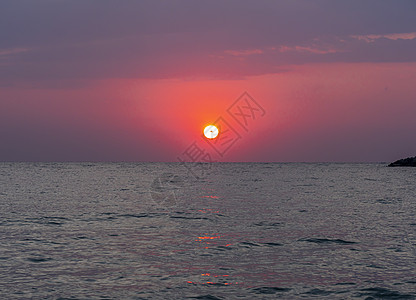 大太阳过海日出橙子地平线场景热带天空季节环境海洋戏剧性金子图片