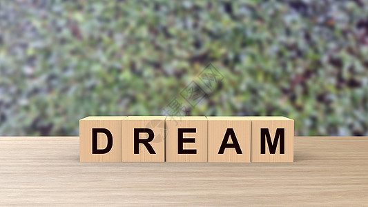 梦想词木制立方体在桌子上垂直模糊背景与攀登绿叶 模型 模板 个人情感 梦想梦想 实现目标 梦想未来 3d 渲染高清图片