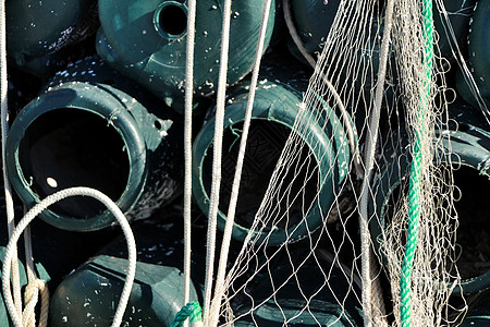 在圣波尔码头捕鱼章鱼和网的陷阱绳索海岸齿轮钓鱼海鲜养殖浮标食物港口社区图片