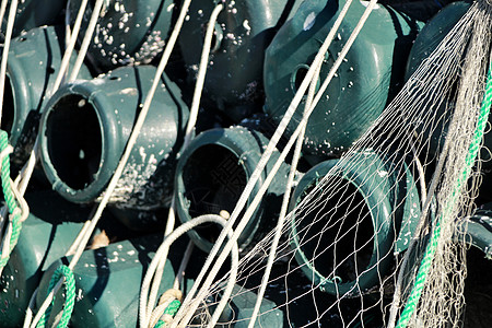 在圣波尔码头捕鱼章鱼和网的陷阱海洋生物齿轮渔业社区海洋钓鱼血管海岸黏土水产图片