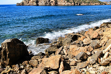 西班牙南部穆尔西亚马扎罗市的洛基海滩海浪火山日出岩石保护寂寞荒野假期海藻海洋图片