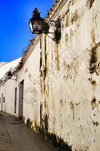 科尔多瓦的狭窄街道和壮观的外墙建筑日光场景直辖市风景城市古董村庄路灯住宅图片