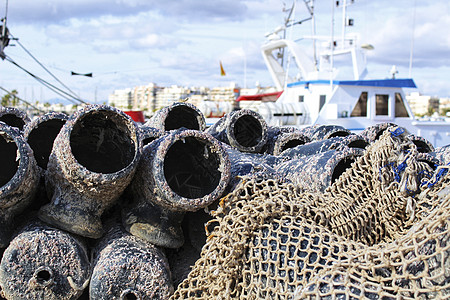 圣波尔码头鱼章鱼和网的陷阱血管海洋生物齿轮海洋社区篮子港口海岸黏土章鱼图片
