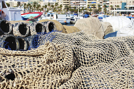圣波尔码头鱼章鱼和网的陷阱黏土渔业港口章鱼篮子海岸钓鱼海洋生物社区浮标图片