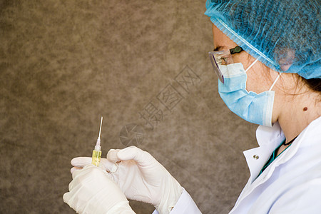 医生和针头 疫苗接种 抗生素和免疫药物护士面罩疾病情况眼镜麻醉女士手术医院图片