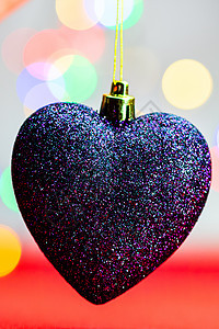 心脏形状的圣诞节装饰 在模糊背景上被孤立风格金子季节彩灯庆典圣诞礼物礼物装饰品假期花环图片