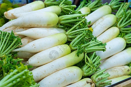 杂货店蔬菜部的萝卜计数器植物块茎叶子生产食物市场味道蔬菜营养冰柱图片