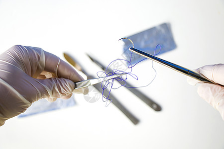 外科手术设备 手术刀 刀 针和缝线 工作室拍摄手套针器愈合医生接缝药品医院程序切口镊子图片