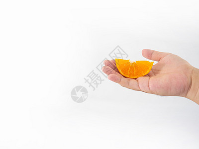 一个男人的手握着橙子 已经变成小海胆宏观女性甜点食物水果果汁手指圆圈热带柚子图片