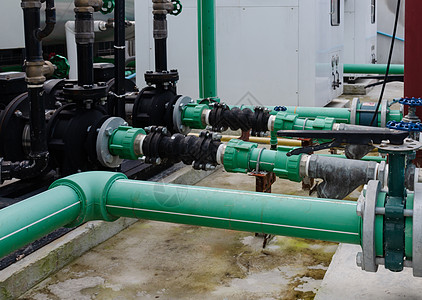 绿色自来水系统植物工具金属阀门压力环境蓝色管子配件力量图片