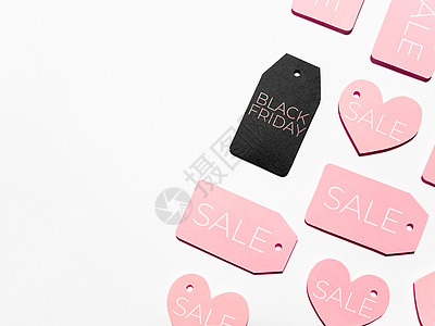 许多粉红色和黑衣标签图案的顶端视图白色商品购物广告少女折扣优惠券价格店铺交易图片