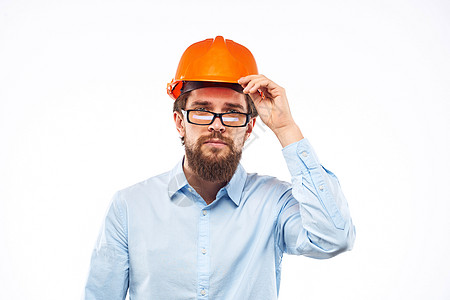 戴橙头盔衬衫的商务人士 建筑安保专业保安人员的建设建筑师微笑工人经理男性工作室白色工程师承包商黄色图片