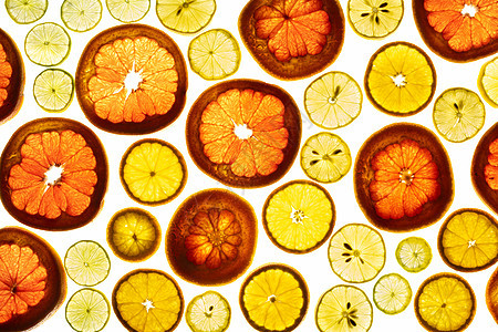 白底孤立的柑橘水果切片顶部视图作品团体柠檬饮食热带橙子果汁食物圆圈柚子图片