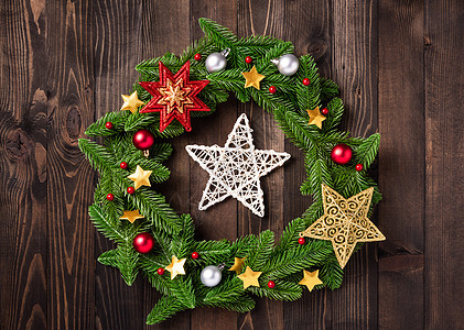 圣诞花圈装饰木头庆典绿色植物框架松树枝条边界玩具星星花环背景图片
