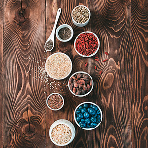 小碗里的各种超食品正方形种子饮食食物收藏高架枸杞亚麻排毒营养图片