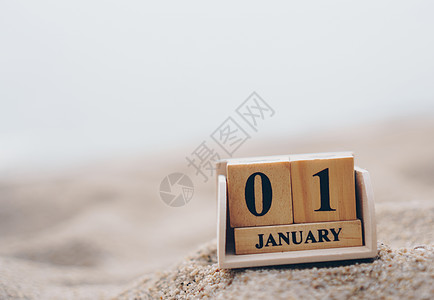 木砖块显示 1 月 1 日或元旦的日期和月历 庆祝和假期长周末季节庆典生日白色木头时间桌子商业日历框架工作图片