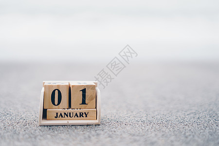 木砖块显示 1 月 1 日或元旦的日期和月历 庆祝和假期长周末季节桌子工作办公室框架日记生日商业数字木头日历图片