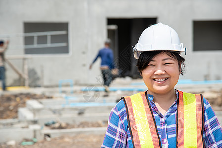 建筑工地的女建筑工程师人数药片工作女士建设者经理商业学徒头盔工程建筑师图片