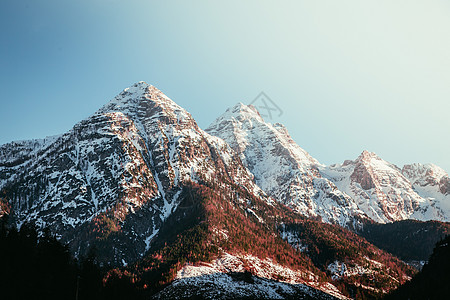 奥地利阿尔卑斯山 雪山的易字风景明信片天空石头爬坡登山宽屏橙子荒野悬崖绝壁图片