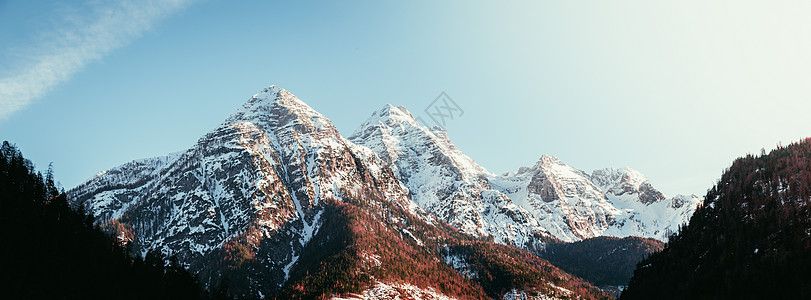 奥地利阿尔卑斯山 雪山的易字风景爬坡绝壁登山宽屏冒险天空太阳岩石悬崖橙子图片