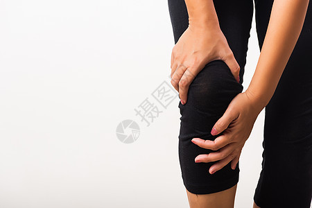 女人的膝盖疼痛 用手握膝关节肌腱女士锻炼事故身体治疗解剖学卫生药品肌肉图片