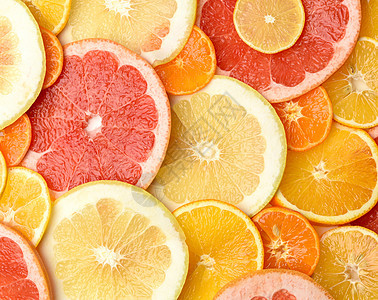 柑橘类水果切成圆形 橙子 葡萄柚 柠檬 橘子 成熟多汁的水果营养食物红色柚子圆圈工作室黄色热带果汁图片