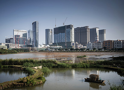 从中国大陆的塔帕Taiipa看风景天际摩天大楼城市建筑物度假村金光景观大道游客图片