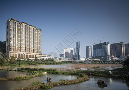 从中国大陆的塔帕Taiipa看游客风景金光景观大道城市酒店度假村摩天大楼建筑物图片