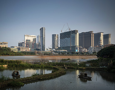 从中国大陆的塔帕Taiipa看风景天际度假村摩天大楼金光游客城市大道酒店建筑物背景图片