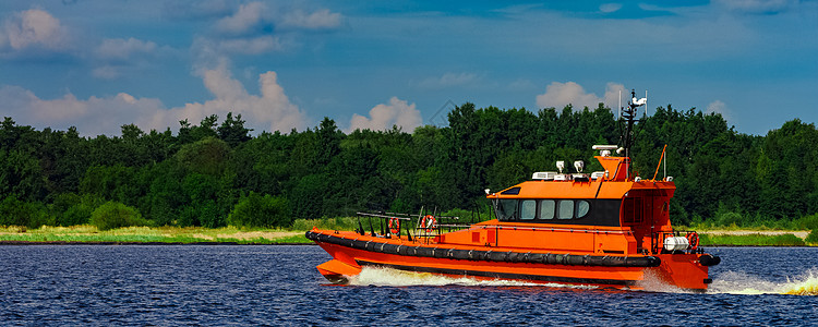 橙色试点船已投入运行人员速度血管服务橙子警卫运输销售飞行员海洋图片
