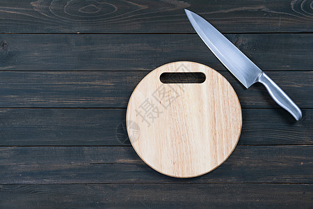 厨房刀和木制圆形空切板厨具菜刀工具餐具木头刀刃砧板餐厅用具厨师图片