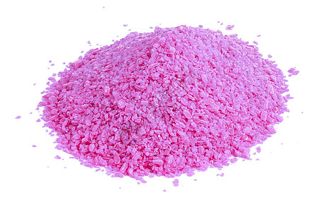 干粉红色化学颗粒堆积     在白色背景上隔绝的近身图片