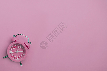 粉红背景的粉色时钟闹钟 登记地点图片