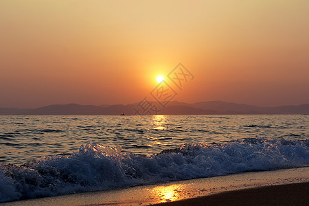 海景美丽 日落在海面上阳光太阳旅行假期反射海滩海岸线蓝色海岸天空图片