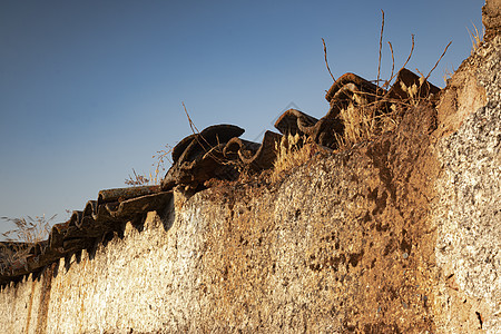 旧的破碎的废旧城镇房屋龙头地平线太阳天堂沙漠巧克力村庄天气冒险干旱图片