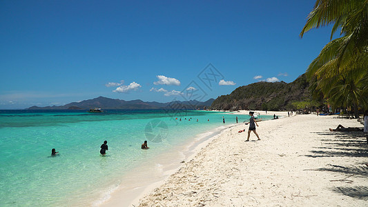 菲律宾马卡普亚热带岛屿上美丽的海滩海洋蓝色旅游海岸线天空支撑旅行海景假期棕榈图片