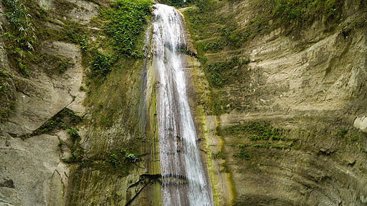 美丽的热带瀑布菲律宾宿务宿务天堂旅游岩石流动旅行石头木头叶子环境溪流图片