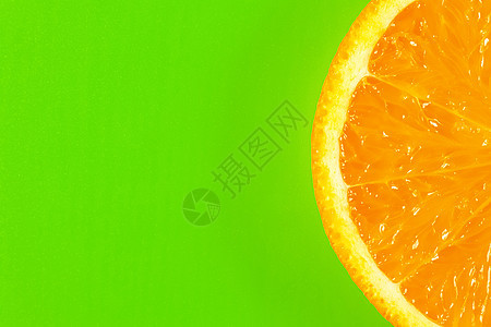 绿色背景宏上的橙色切片 标签的地方纺织品橙子收据圆圈橘味假期柠檬营养沙拉宏观图片