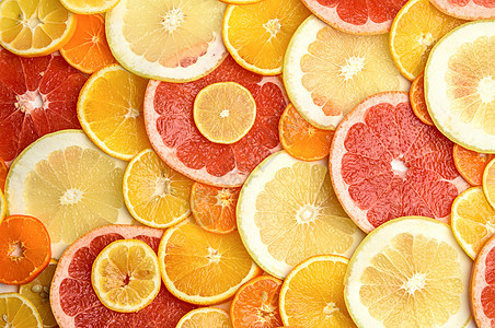 柑橘果切成圆形 橙 葡萄油 柠檬 橘子果汁圆圈黄色热带水果红色橙子柚子食物工作室图片