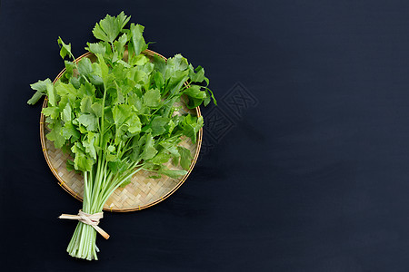 深色背景的中国菜菜菜芹菜烹饪团体农业萝卜饮食叶子花园食物植物图片