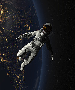宇航员在有地球背景的太空中行走图片