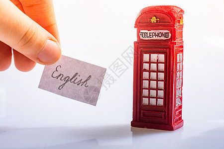 电话亭附近用英文写作的手纸商业学费世界旅行外国国际语言学班级知识语言图片