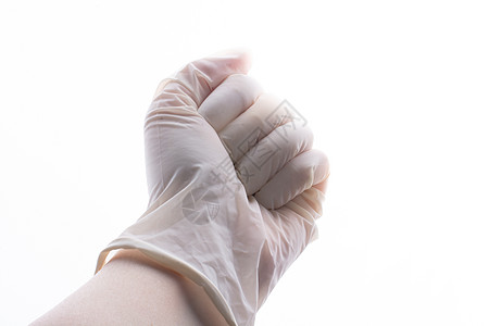 为保护而手戴保护手套 佩戴不育的乳胶防身手套传染性感染职员流感卫生医生护士安全实验室橡皮图片