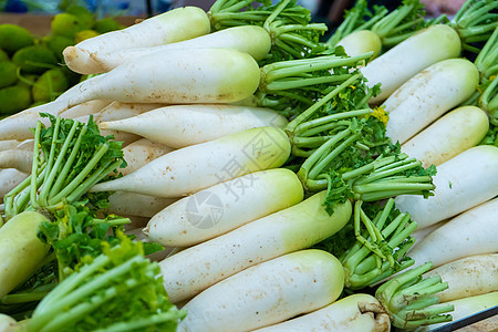 杂货店蔬菜部的萝卜计数器收成食物营养市场大蒜冰柱农场生态长羽团体背景图片